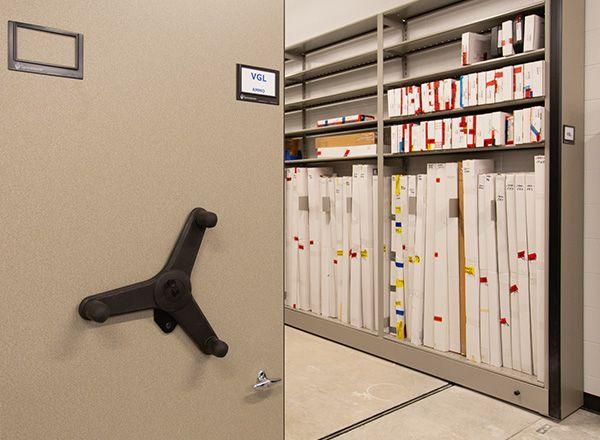 evidence stored on mechanical assist mobile shelving system in evidence room